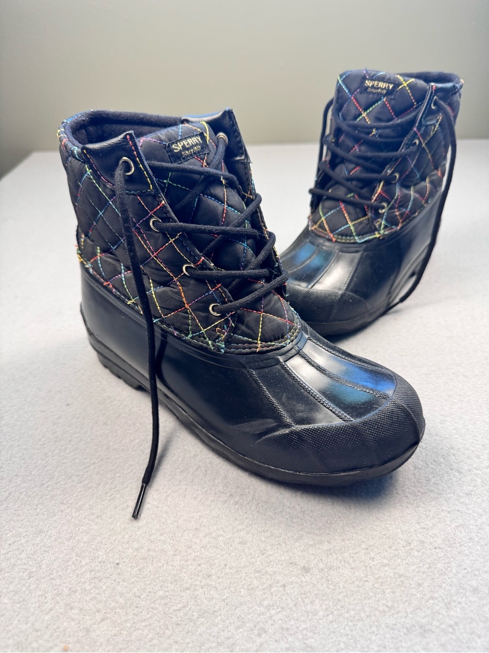 Sperry Black Quilted Lace-Up Rain Boots with Rainbow Stitching
